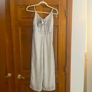 Size Small: Cream & blue striped jumpsuit with front tie. Mid-calf length.